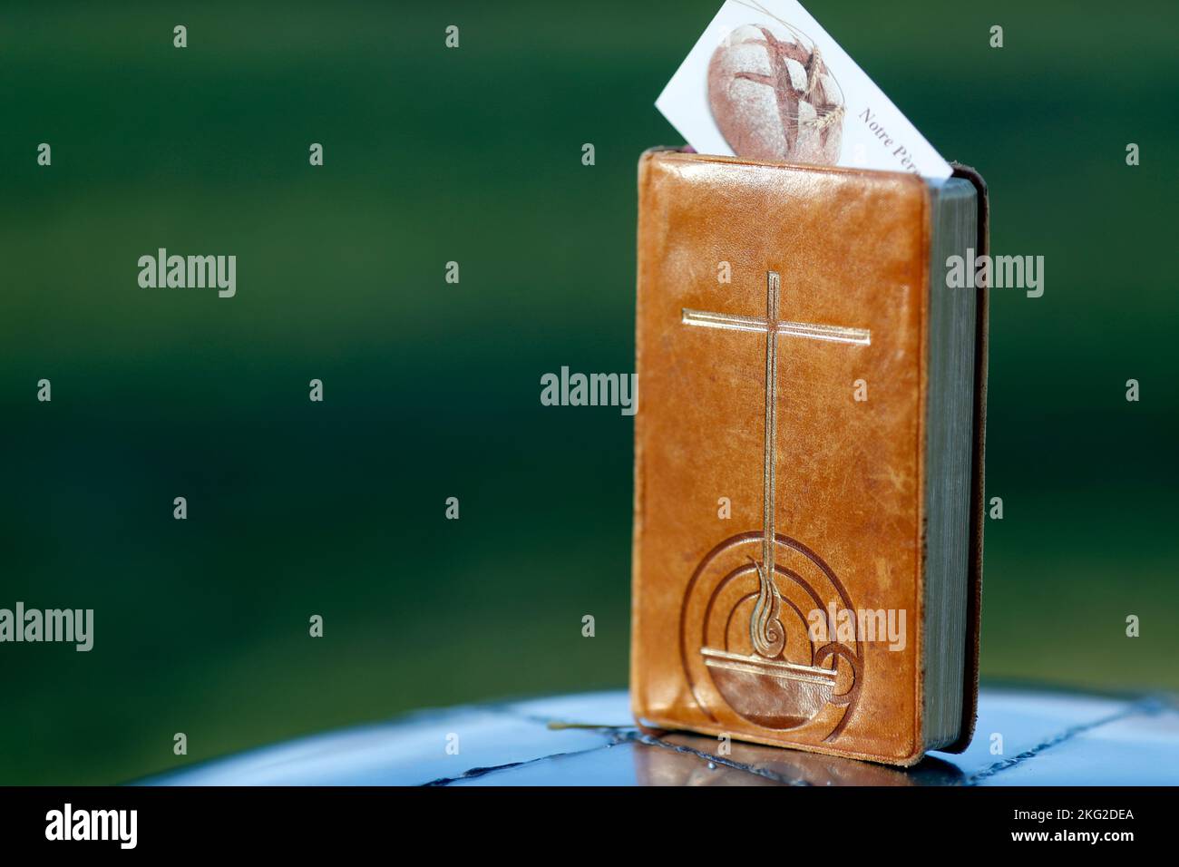 Old bible brown leather cover with cross Stock Photo Alamy