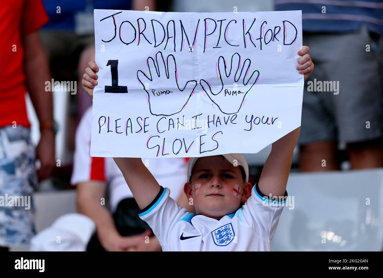 Doha, Qatar. 21st Nov, 2022. A young England fan begs for Jordan Pickford's gloves during the FIFA World Cup match at Khalifa International Stadium, Doha. Picture credit should read: David Klein/Sportimage Credit: Sportimage/Alamy Live News Stock Photo
