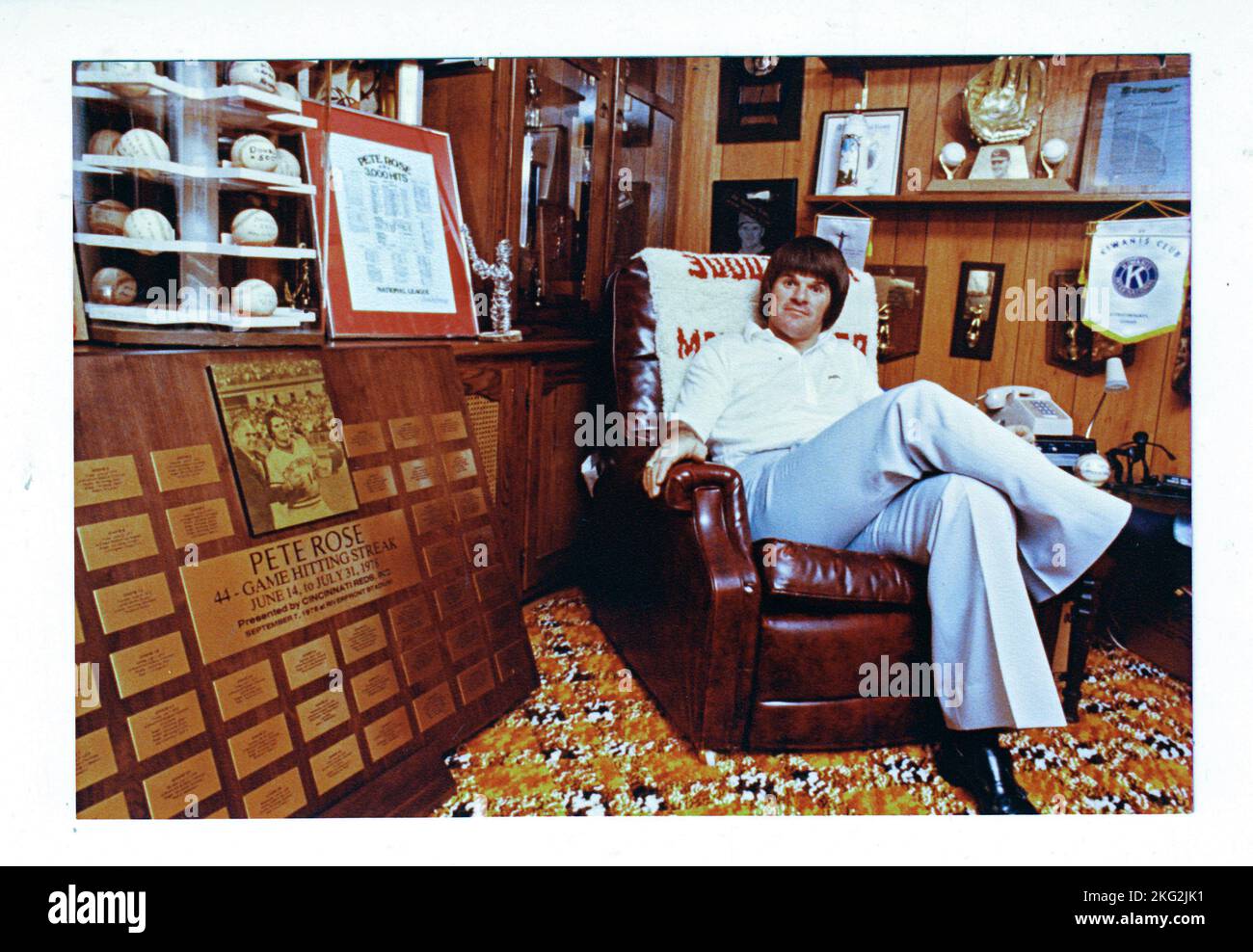 A 1979 posed portrait of Pete Rose at home in his trophy room in Cincinnati, Ohio after becoming baseball's first 2 million dollar man. Stock Photo