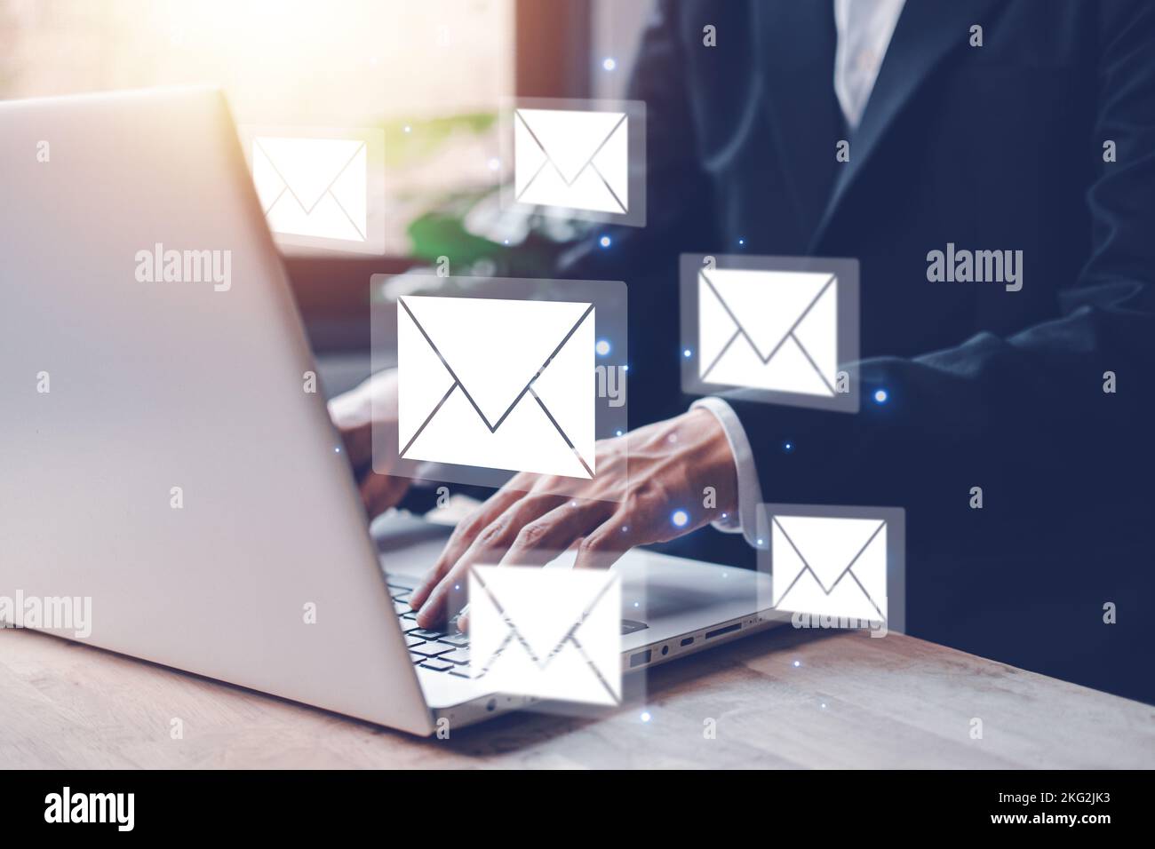 Businessman hands typing notebook (Laptop) with email icon and send email or newsletter