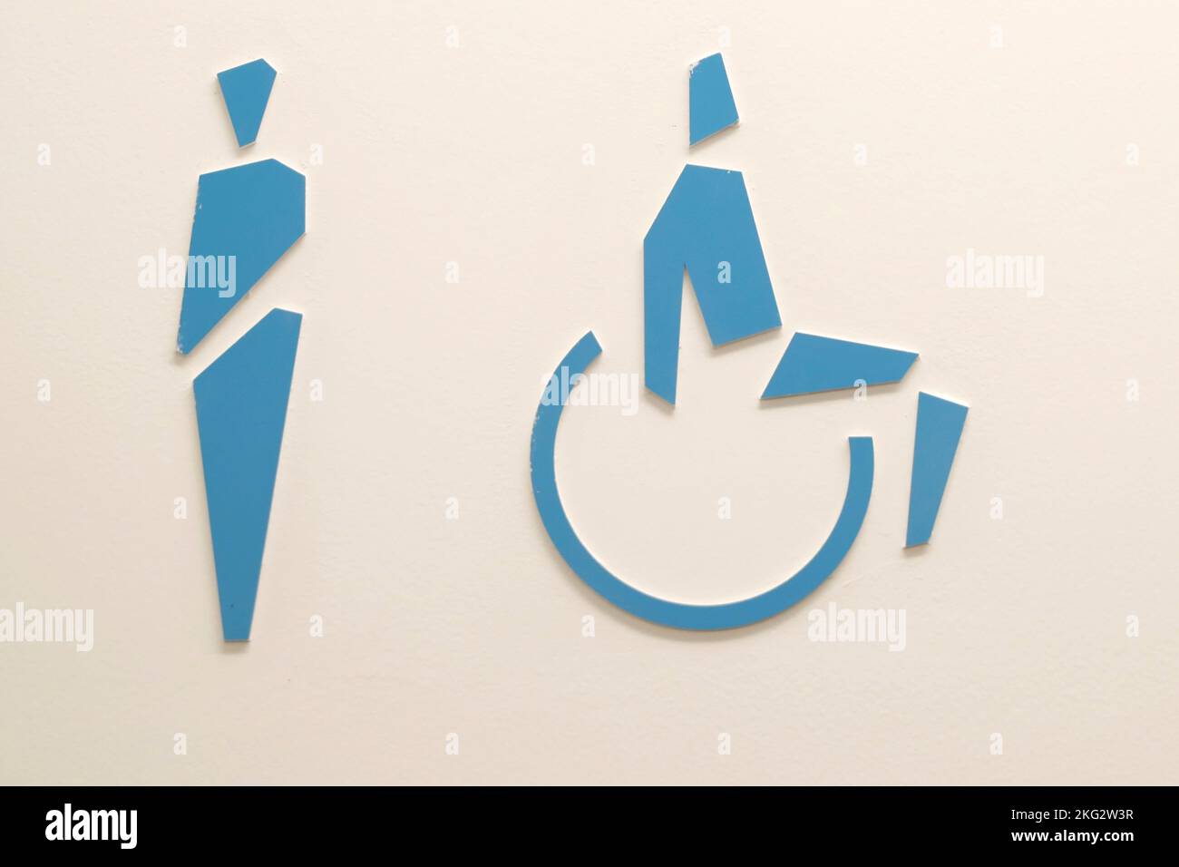 Sign, man and handicapped accessible toilet. Abu Dhabi. Stock Photo