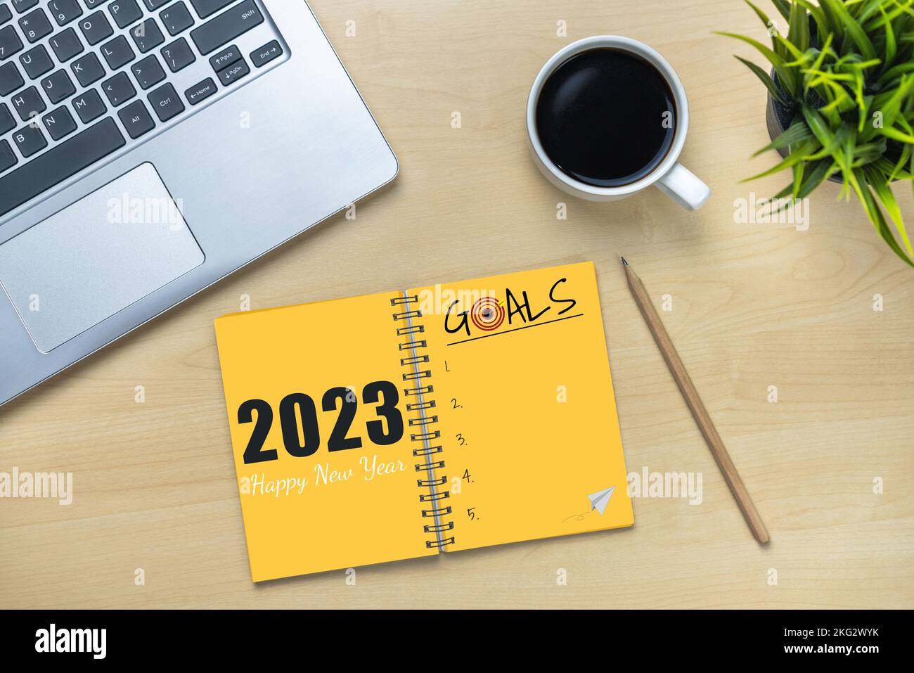2023 Happy New Year Resolution Goal List and Plans Setting - Business office desk with notebook written about plan listing of new year goals and Stock Photo