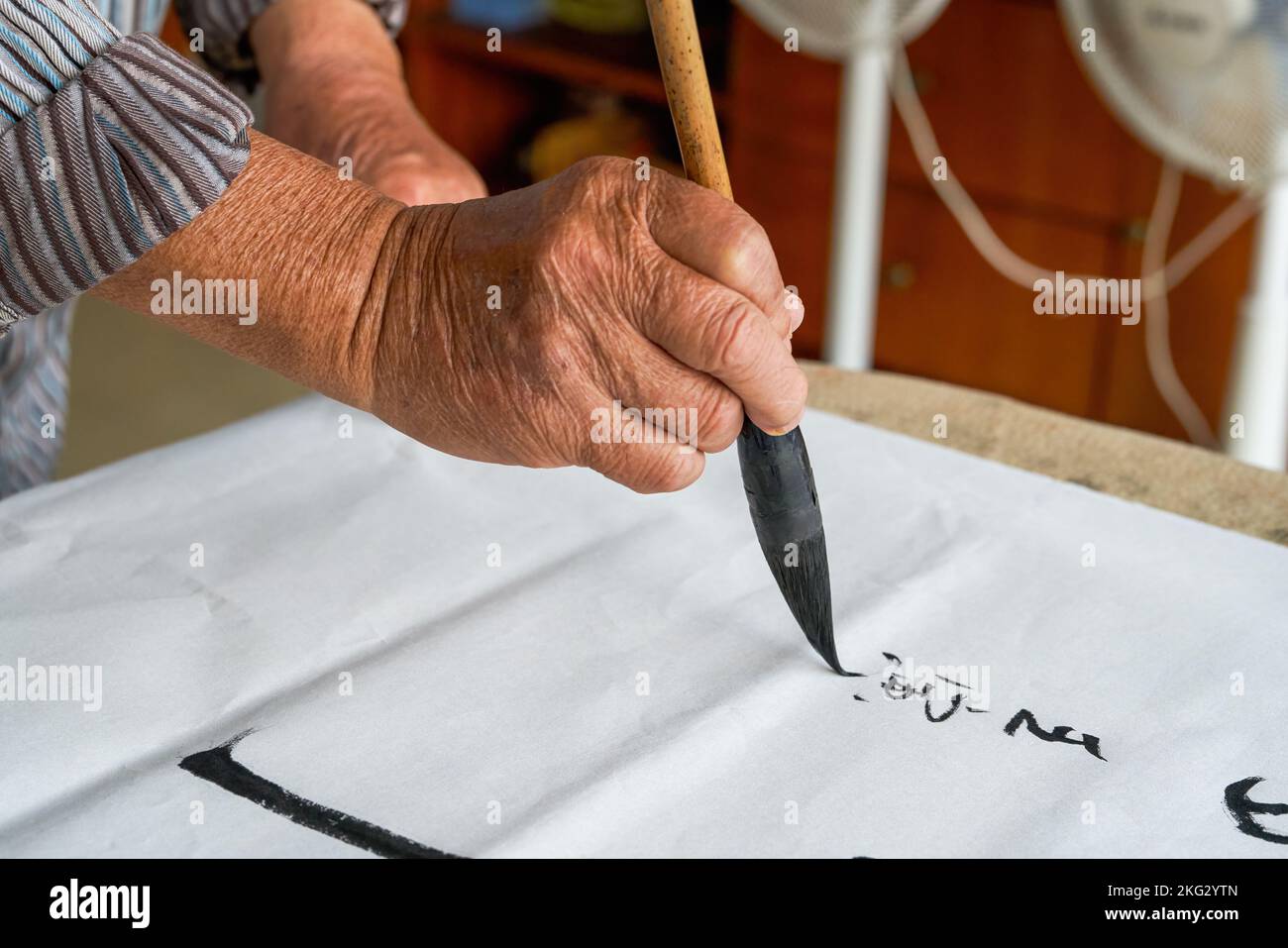 An Old Chinese Calligrapher Is Writing Calligraphy Characters Creating Calligraphy Works Stock An Old Chinese Calligrapher Is Writing Calligraphy Characters Creating Calligraphy Works Stock