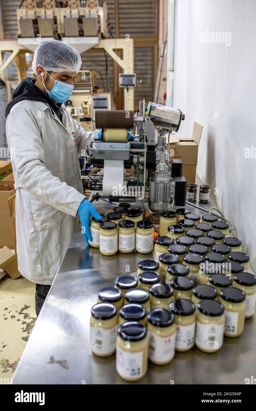 Cooperative making food products in Ferzol, Beqaa, Lebanon. Packing