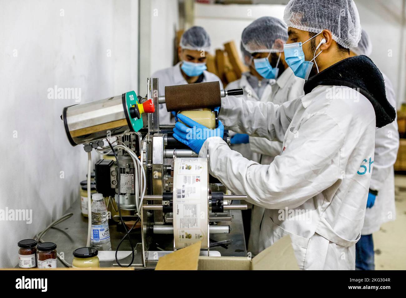 Cooperative making food products in Ferzol, Beqaa, Lebanon. Packing