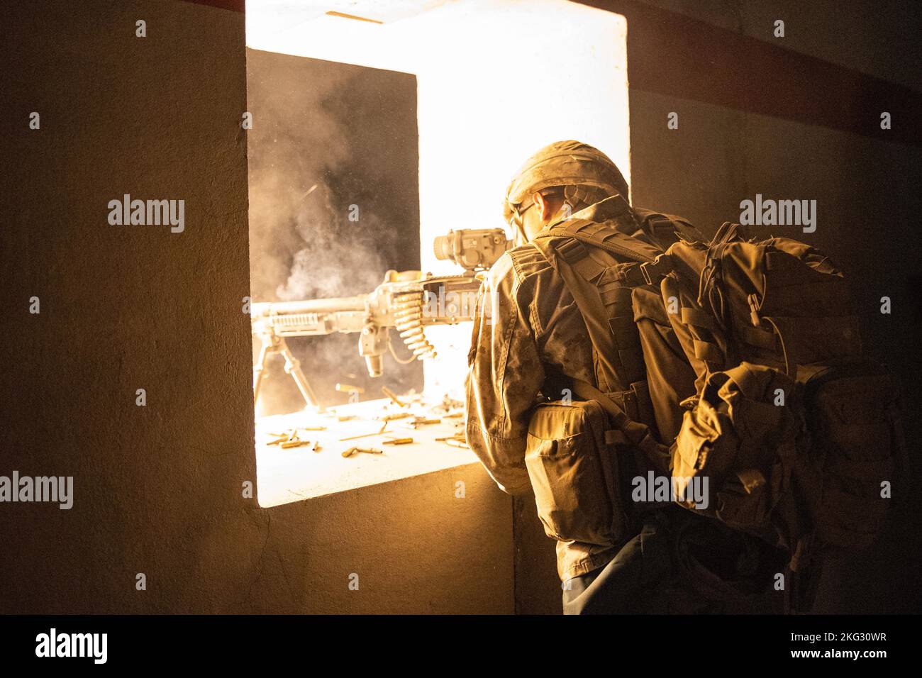 M420b A U.S. Marine Corps machine gunner assigned to 2nd Battalion, 7th ...