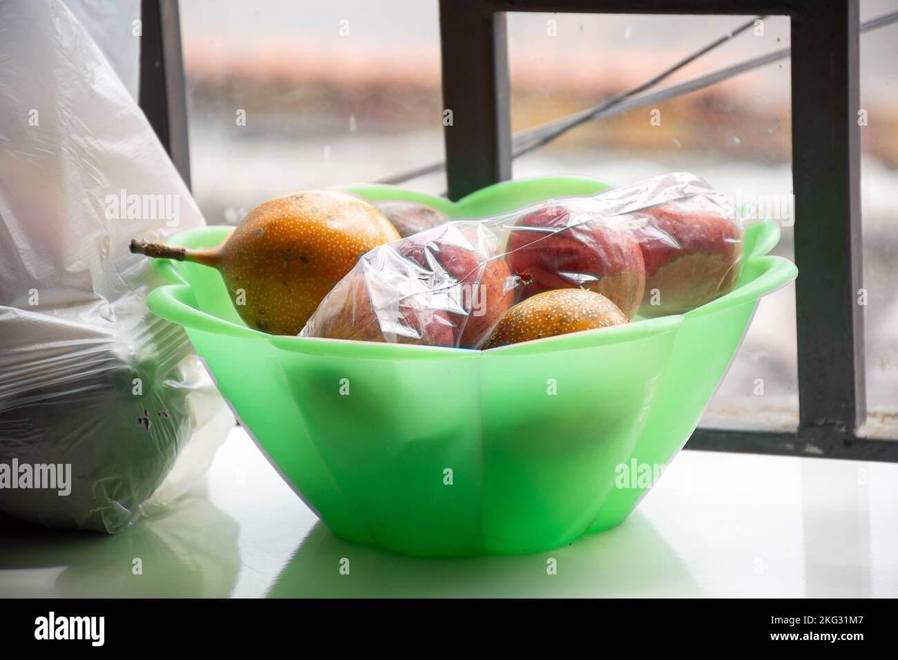 passion fruit basket in colombian house Stock Photo Alamy