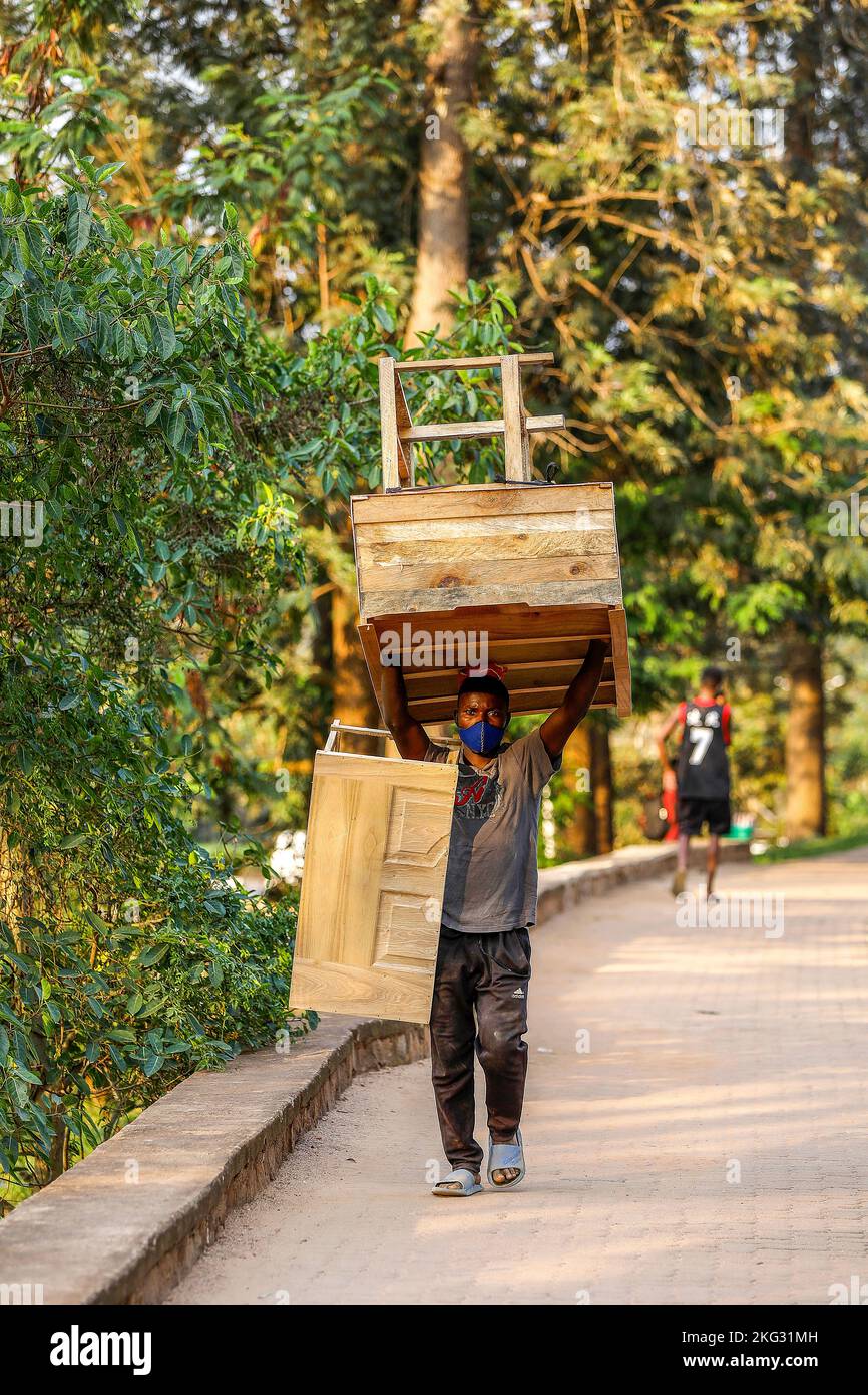 Man carrying furniture in Kigali, Rwanda Stock Photo Alamy