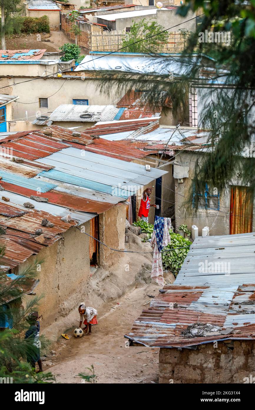 Street with derelict homes in Kigali, Rwanda Stock Photo