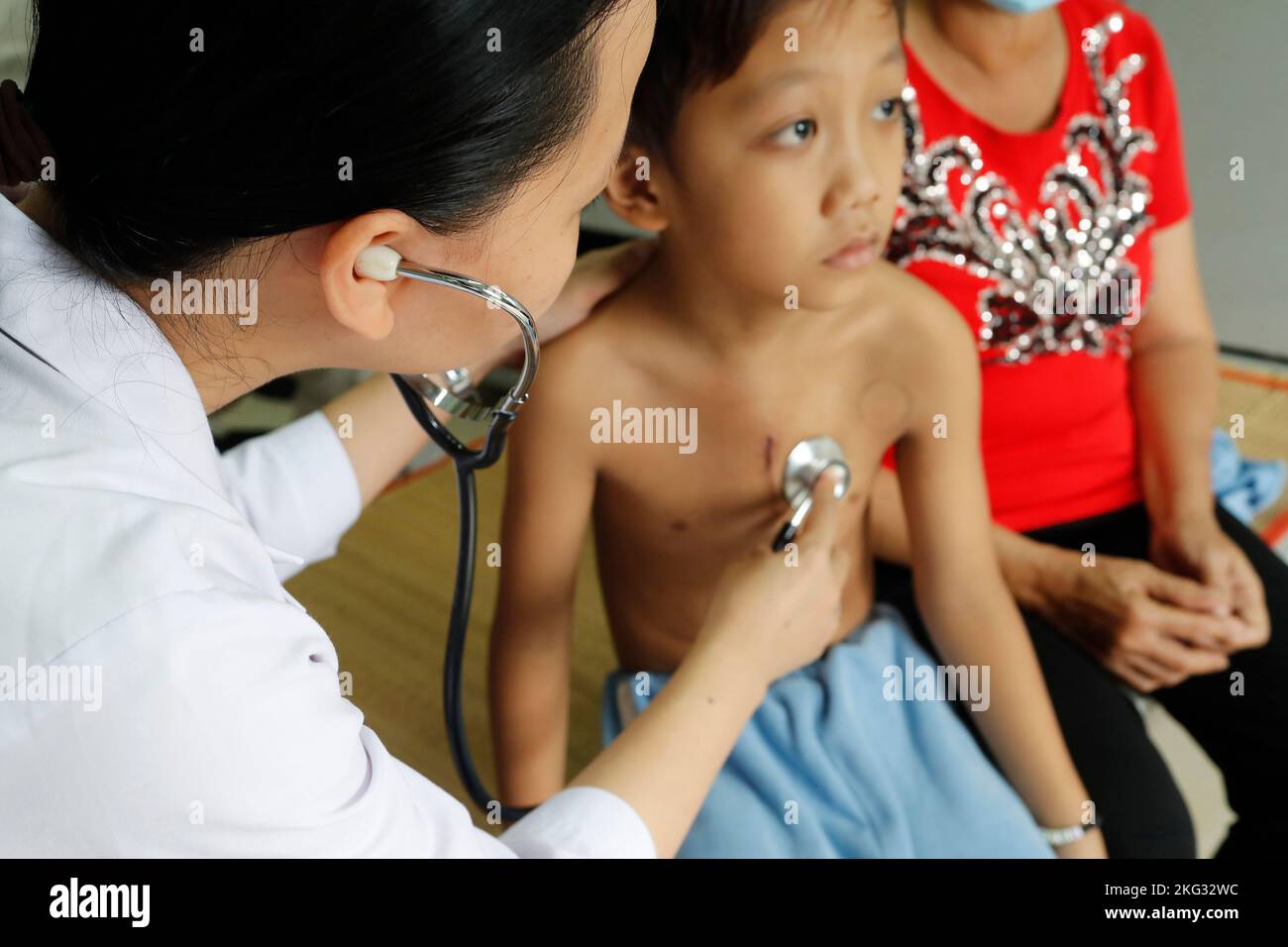 Children's pavilion run by Domincan catholic sisters and Chaine de l'Espoir. Child suffering of heart disease. Medical consultation.  Ho Chi Minh city Stock Photo