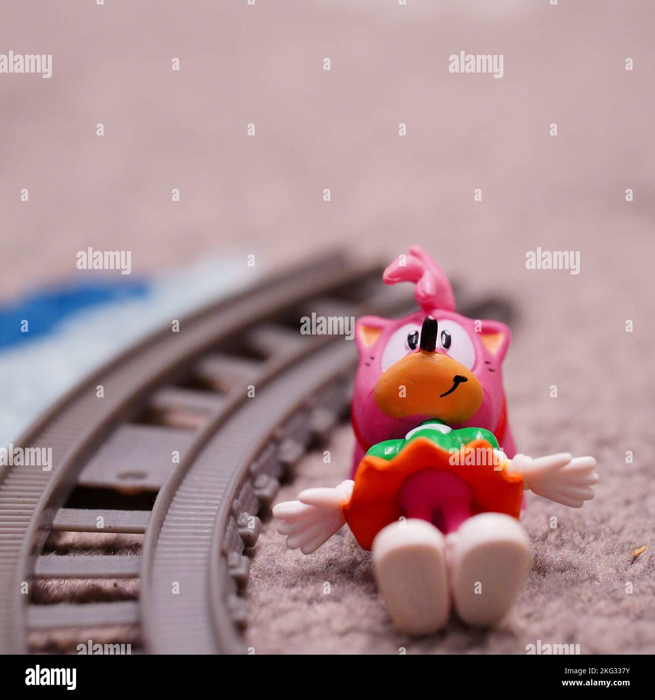 An Amy Rose toy model figure on a train track from the Sonic series Stock  Photo