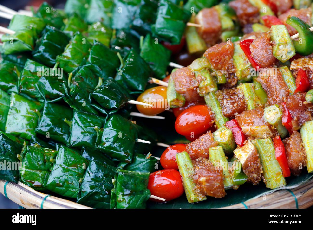 Vietnamese local food market. Bo la lop, a grilled beef roll and porc