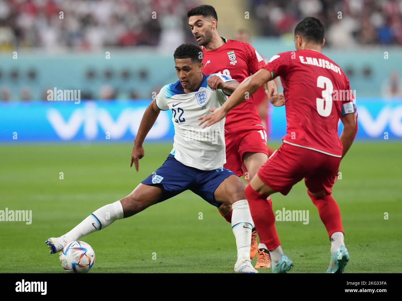England's Jude Bellingham (left) in action during the FIFA World Cup ...