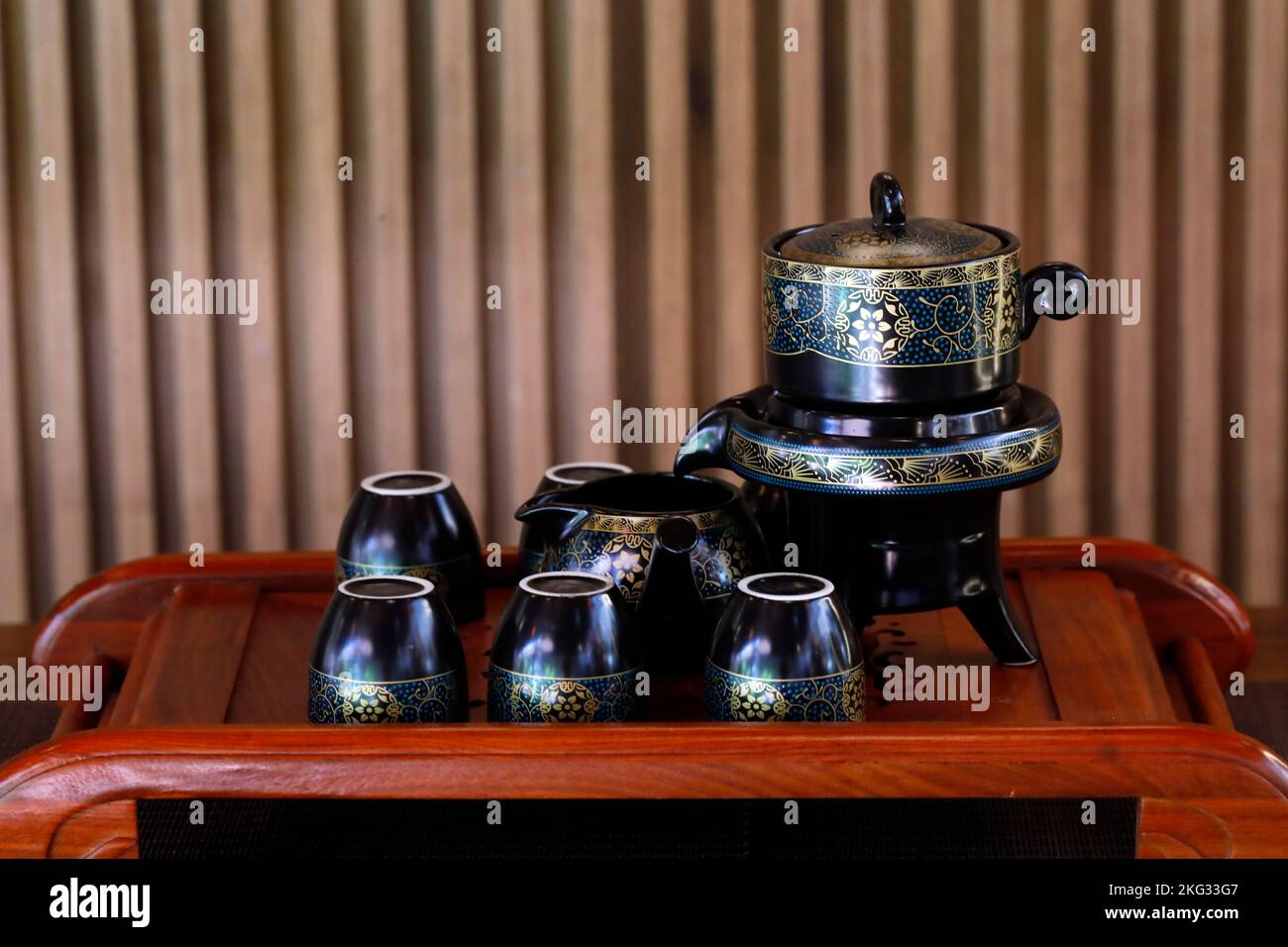 Ceramic teapot and cups for chinese tea ceremony in restaurant. Vietnam