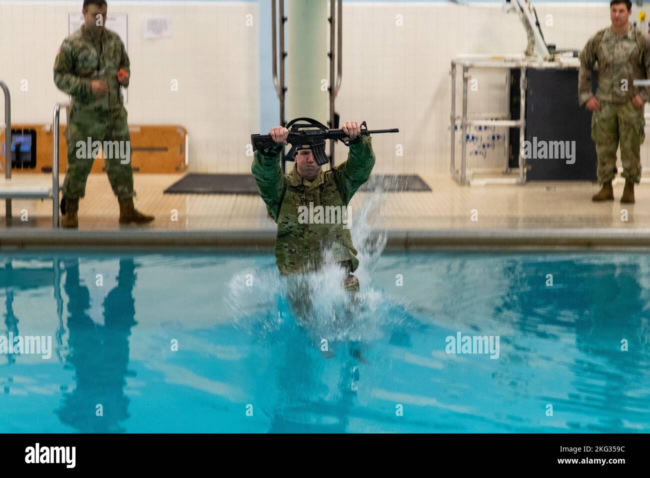 1st Lt. Austin Pinkerton from Bassett Army Medical Center, Fort Wainwright, steps off the diving board during the Combat Water Survival Test in the 2022 Medical Readiness Command, Pacific Best Medic Competition Wednesday, October 26th 2022 at Joint Base Lewis-McChord. Stock Photo