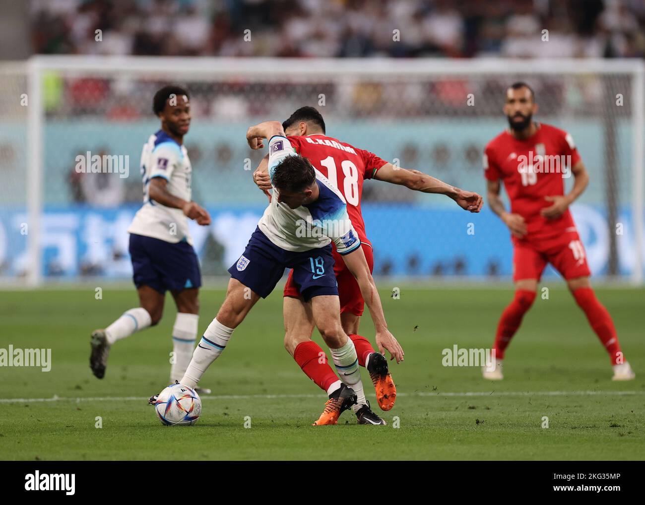 Al Rayyan, Qatar. 21st November 2022; Khalifa International Stadium, Al Rayyan, Qatar; FIFA World Cup Football, England versus Iran; Mason Mount of England challenged by Majid Hosseini of Iran Stock Photo