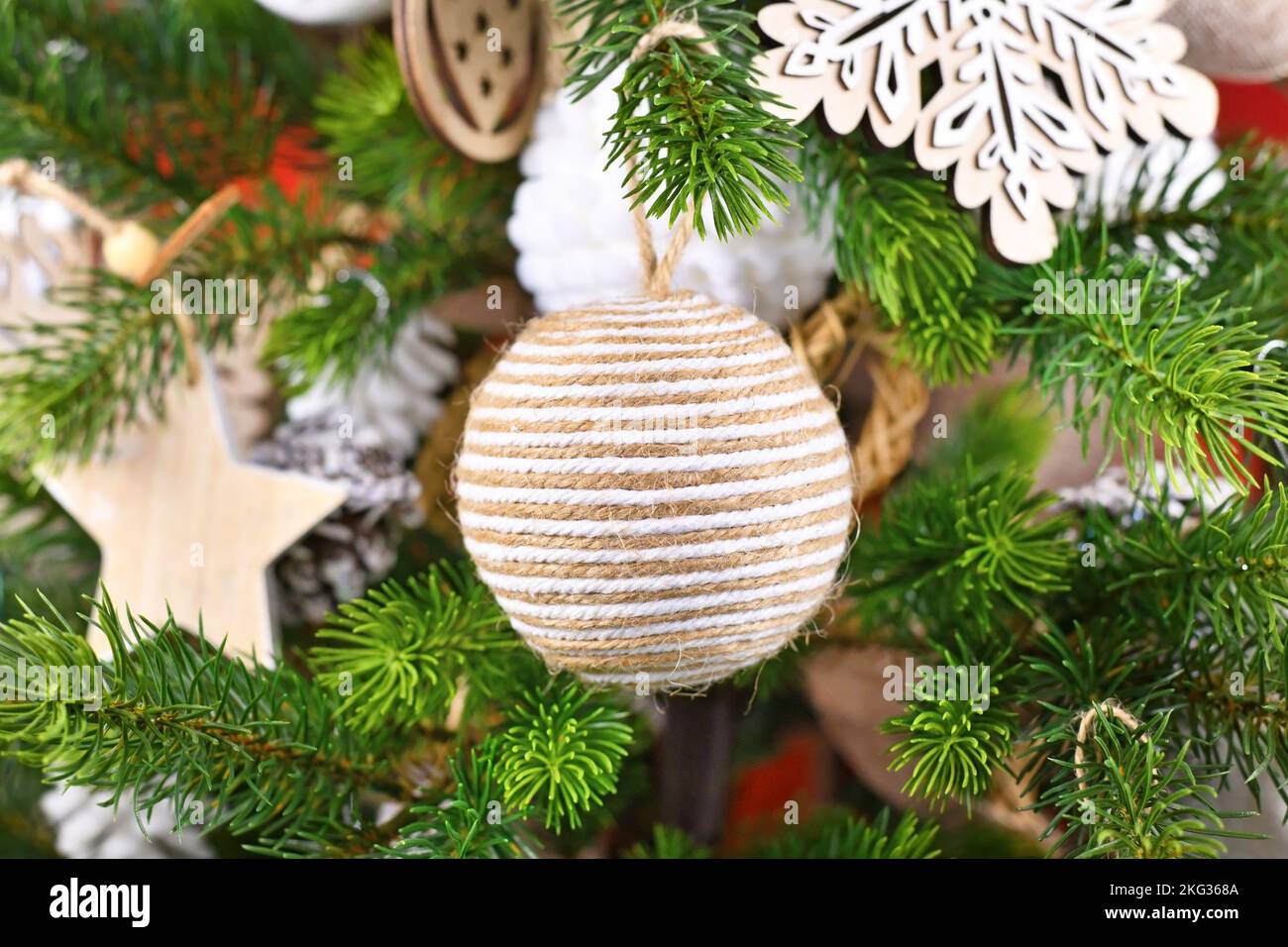 Natural Christmas tree ornament bauble made from beige and white jute