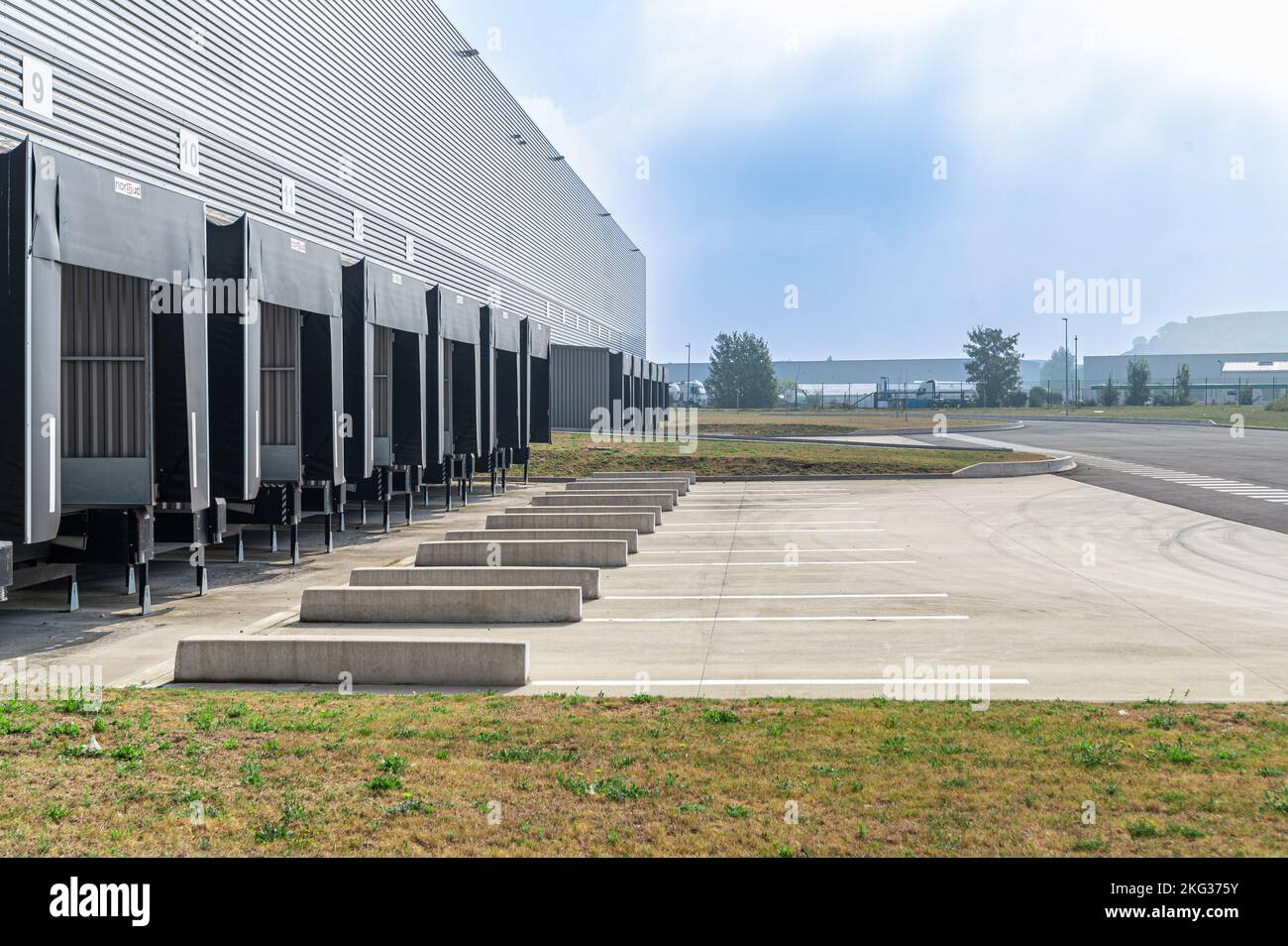Perspective shot of industrial building featuring loading dock sections ...
