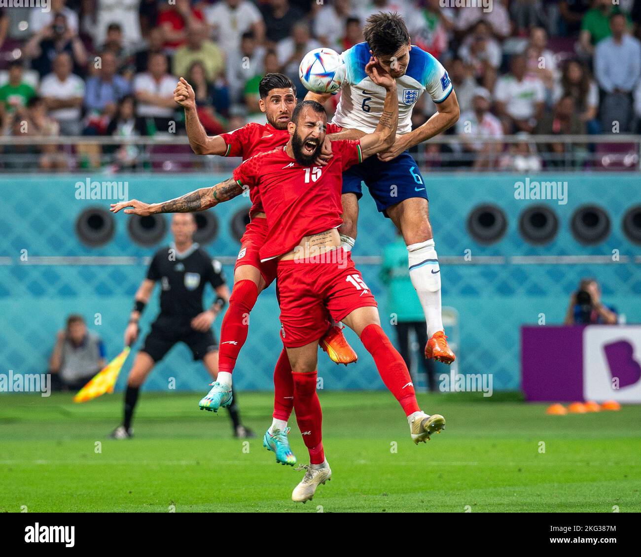 Doha, Catar. 21st Nov, 2022. Harry Maguire of England and Rouzbeh Cheshmi of Iran during a match between England and Iran, valid for the group stage of the World Cup, held at Khalifa International Stadium in Doha, Qatar. Credit: Richard Callis/FotoArena/Alamy Live News Stock Photo