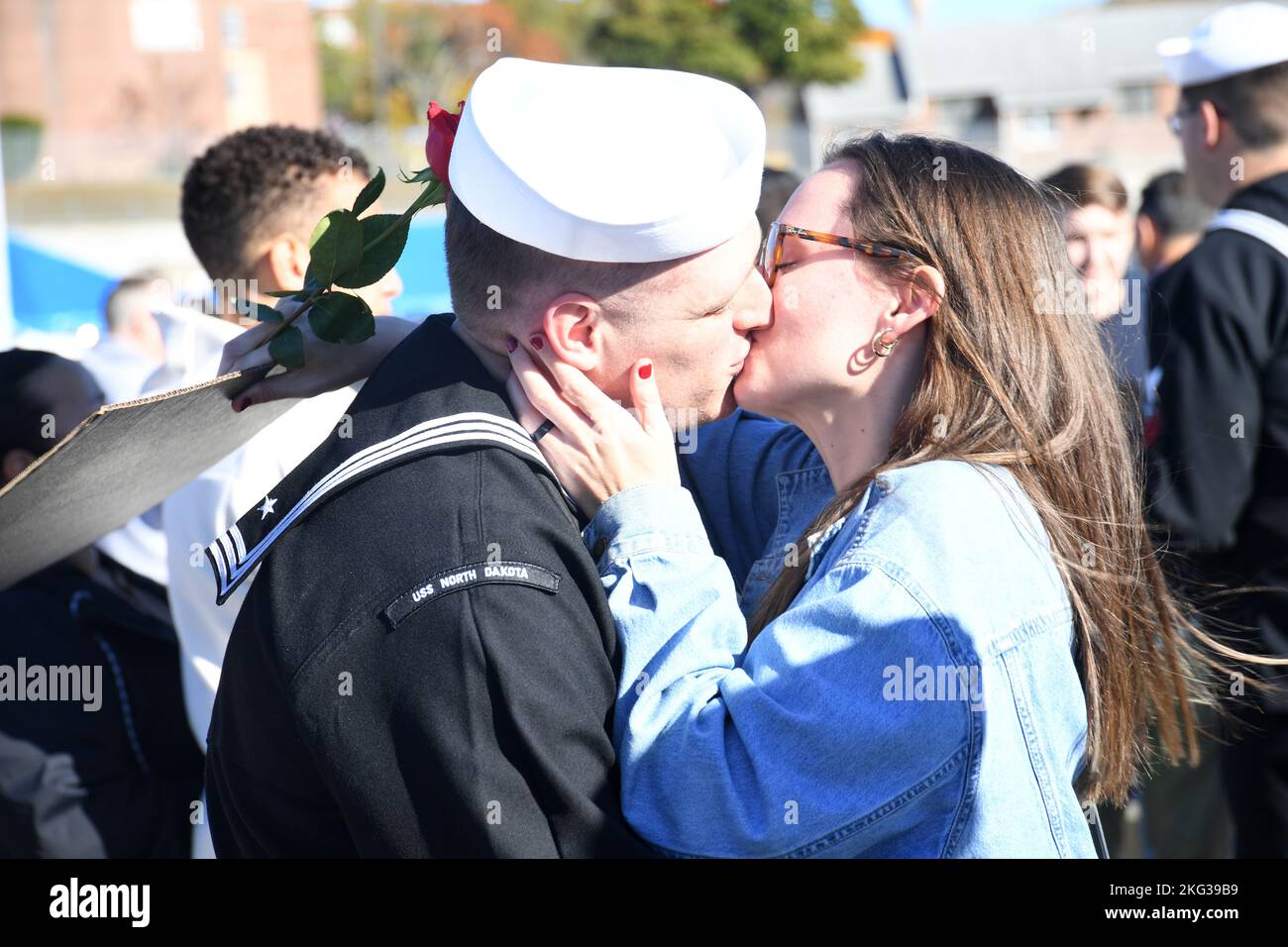 221027-N-GR655-0142 GROTON, Conn. (October 27, 2022) – An sailor assigned to the USS North Dakota (SSN 784) embraces his loved one during a homecoming event at Naval Submarine Base New London in Groton, Conn., Oct. 27. North Dakota returned to homeport from its 3rd full deployment since commissioning in support of the Navy's maritime strategy - supporting national security interests and maritime security operations - in the 6th Fleet area of operations. The Virginia-class fast attack submarine USS North Dakota and crew operate under Submarine Squadron (SUBRON) FOUR and its primary mission is t Stock Photo