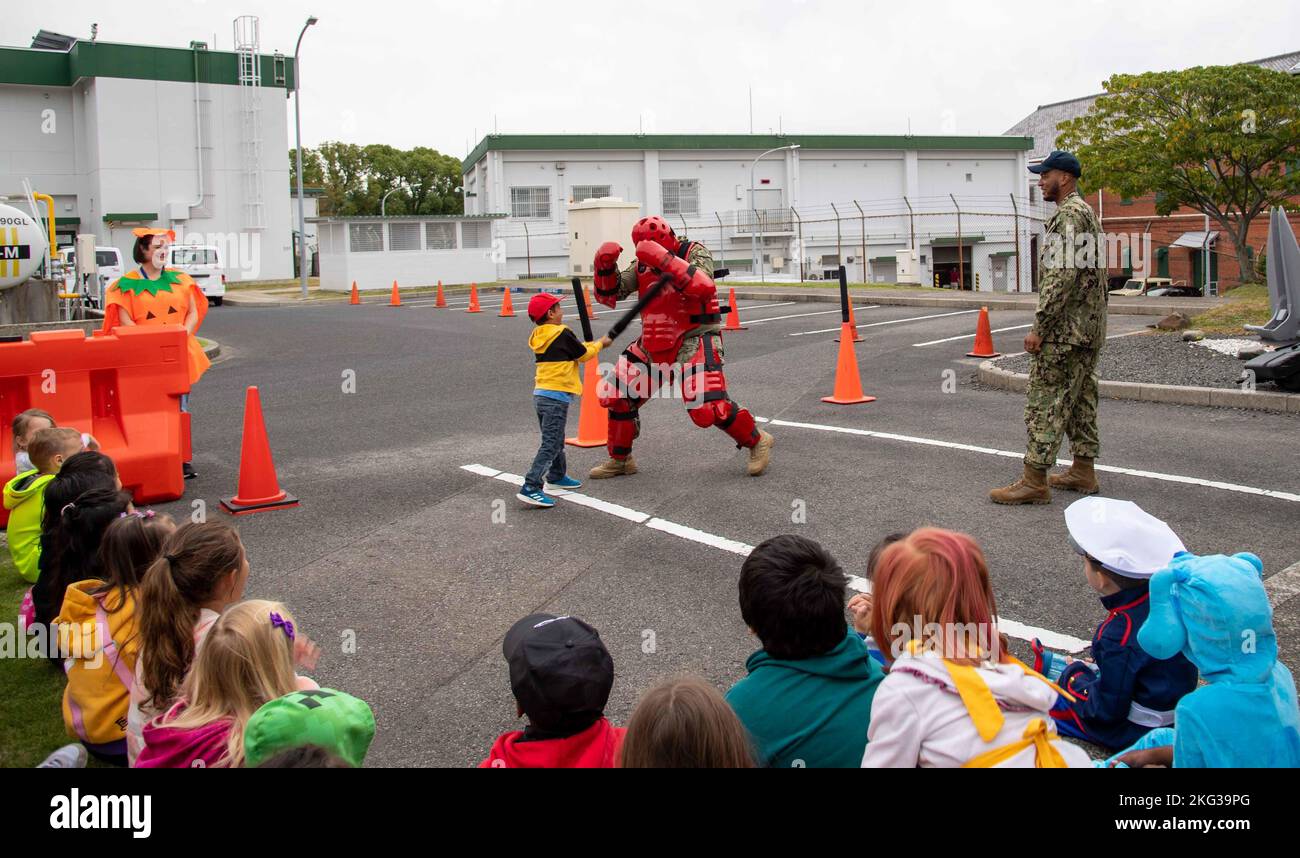 A Sasebo Elementary School student strikes Master-at-Arms 2nd Class ...