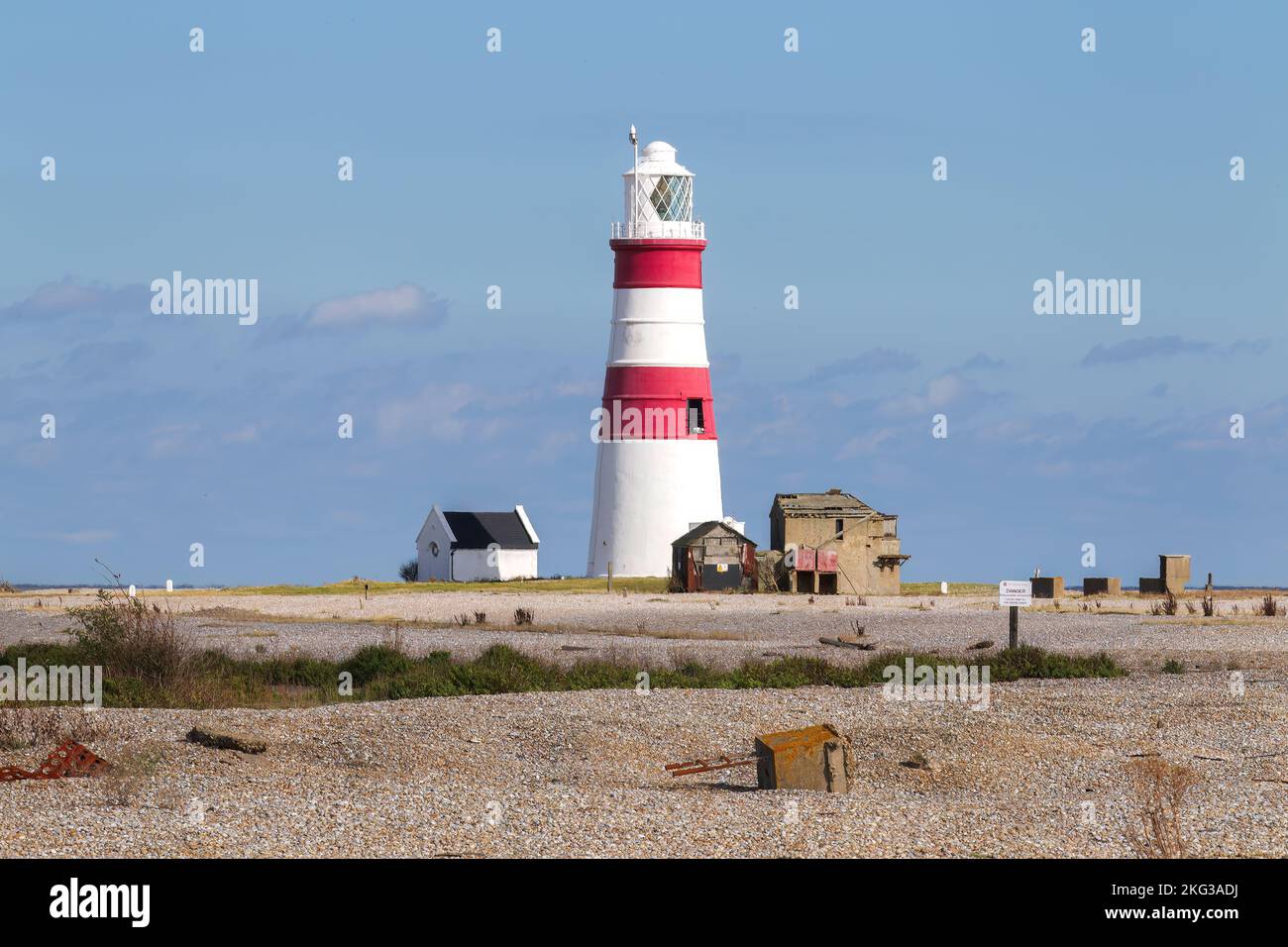 Orford Ness, atomic weapons research site, showing lighthouse and shingle beach, Suffolk, United Kingdom Stock Photo