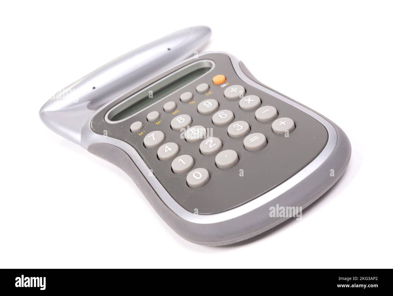 Vintage calculator, isolated on white, dirty and covered in dust Stock