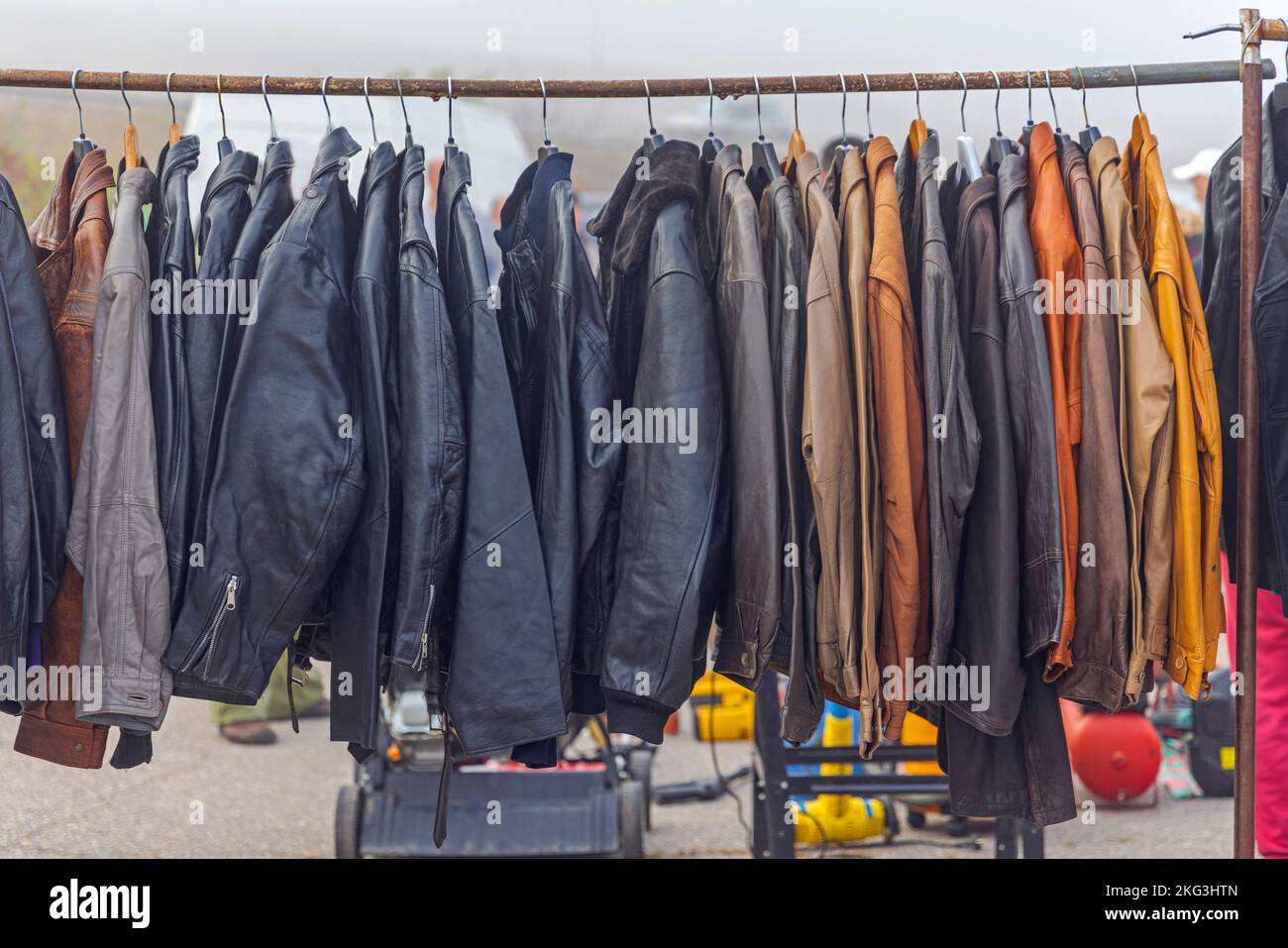 Many Classic Style Real Leather Jackets for Sale at Flea Market Stock Photo
