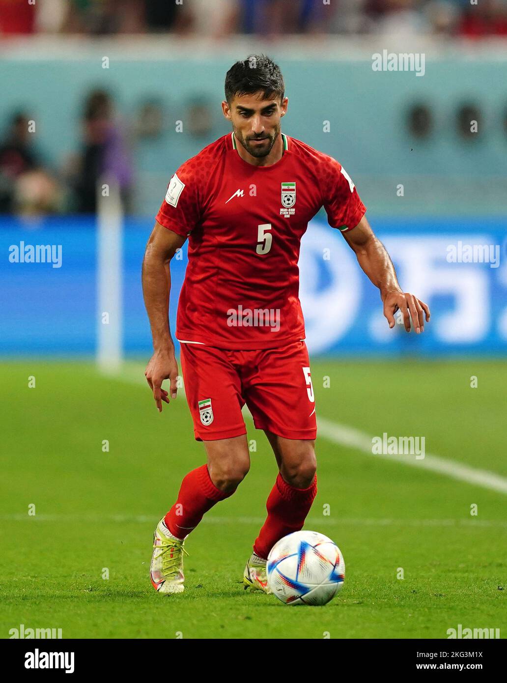 Iran's Milad Mohammadi during the FIFA World Cup Group B match at the Khalifa International Stadium, Doha. Picture date: Monday November 21, 2022. Stock Photo