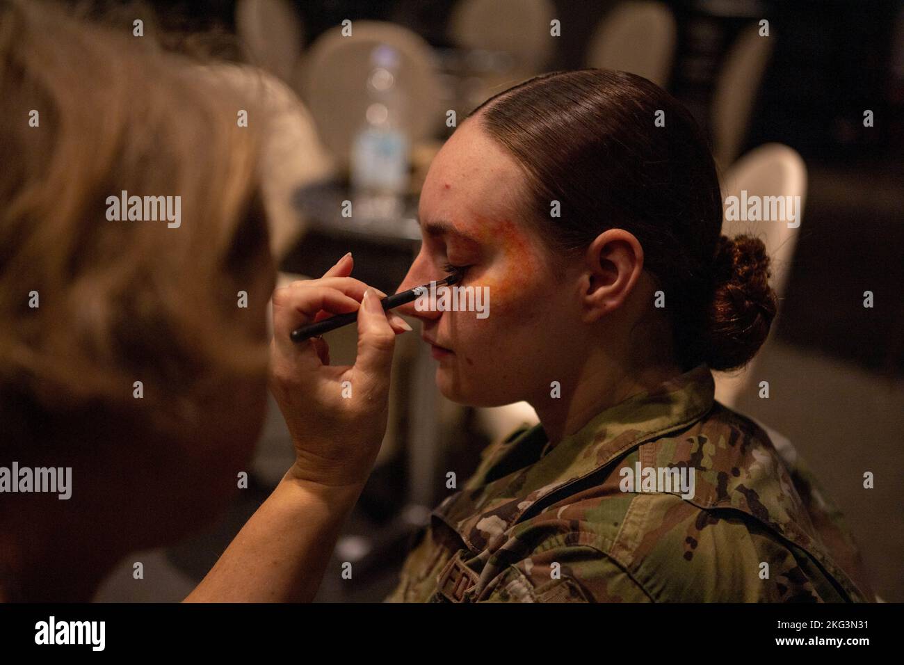 U.S. Air Force Airman 1st Class Madison Livermore, 86th Medical Squadron medical technician, volunteers for the Black Eye Project at Ramstein Air Base, Germany, Oct. 26, 2022. The Black Eye Project is a social experiment to assess public reactions to signs of abuse as part of Domestic Violence Awareness Month. Stock Photo