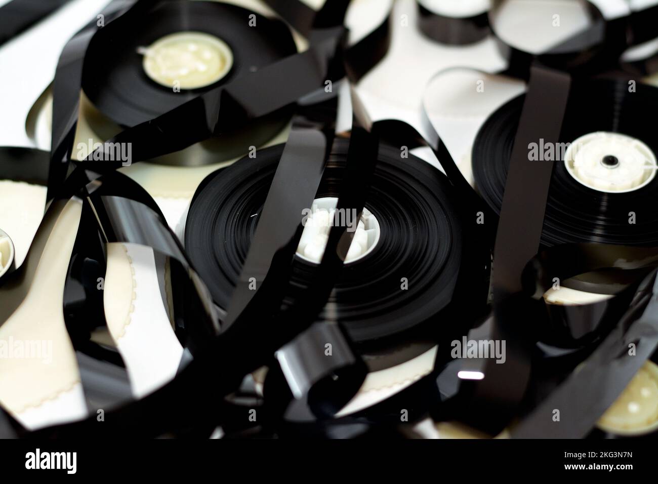 Tape ribbons with the supply and take up reels of VHS video cassette