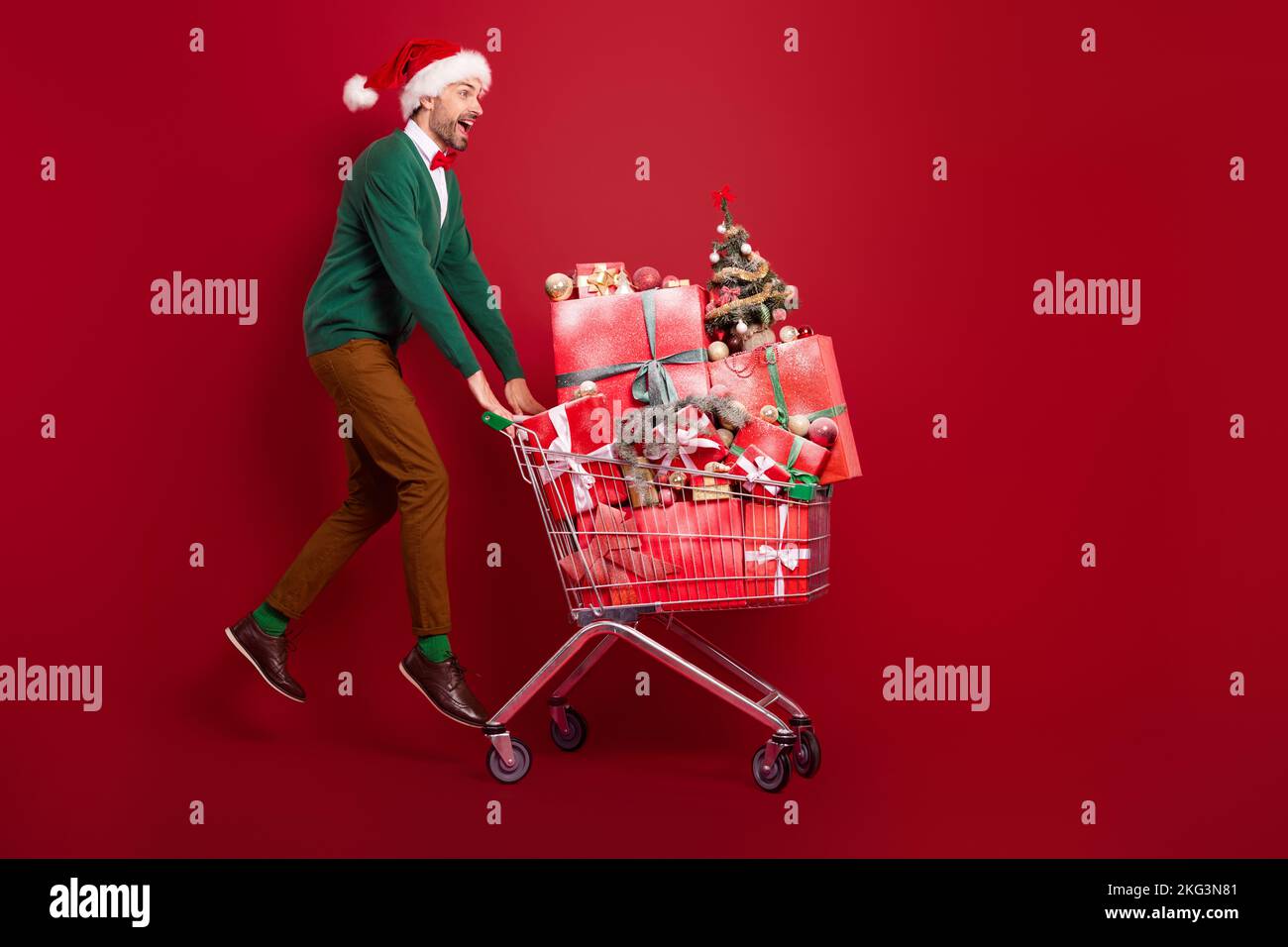 Full size photo of overjoyed excited person jumping pushcart pile stack ...