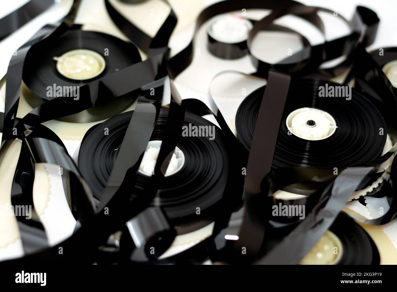 Tape ribbons with the supply and take up reels of VHS video cassette