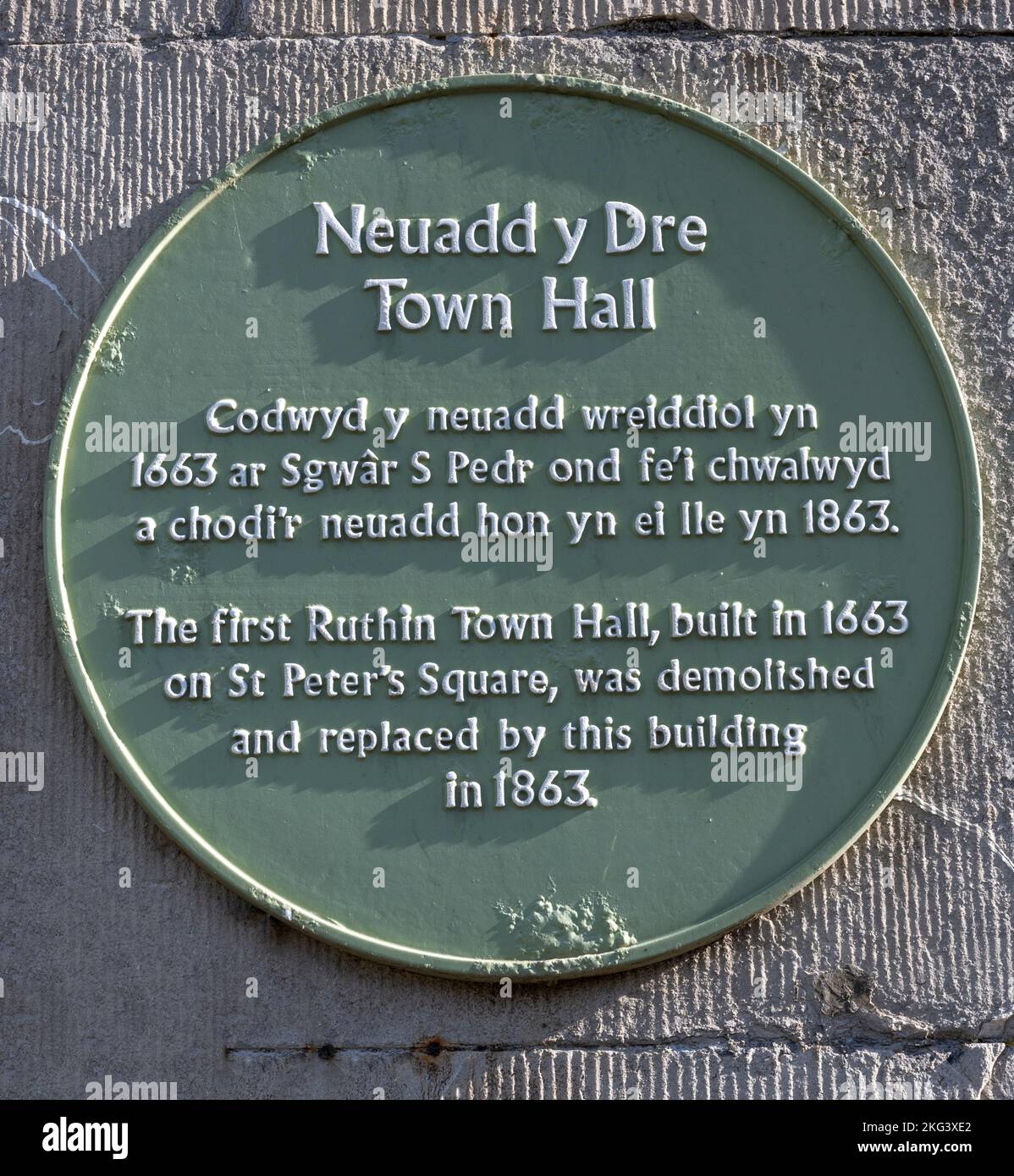 Green heritage plaque at Ruthin Town Hall, Market Street, Ruthin, Denbighshire, Wales, UK Stock Photo