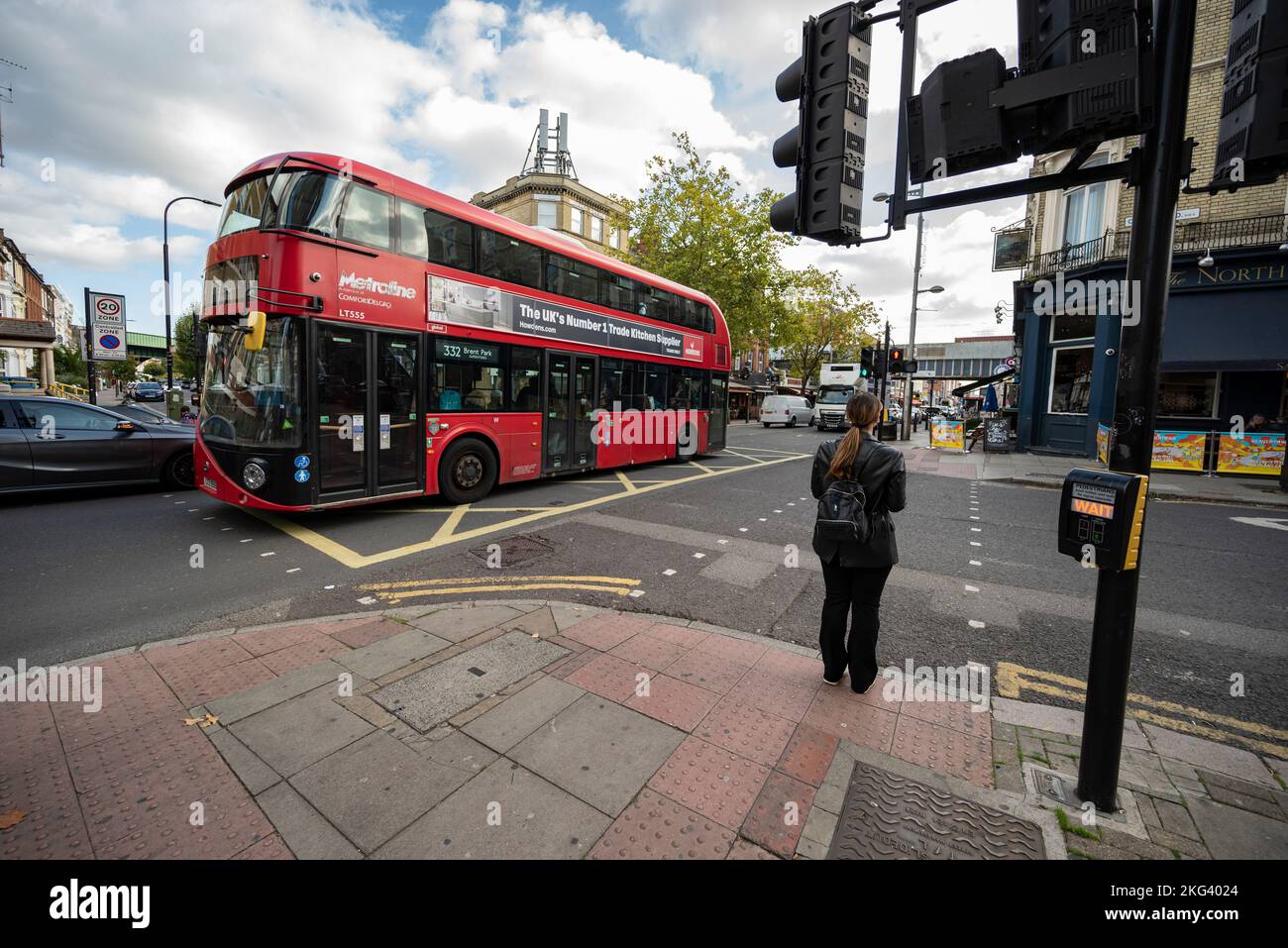 London bus crossing the streets of Kilburn Stock Photo Alamy