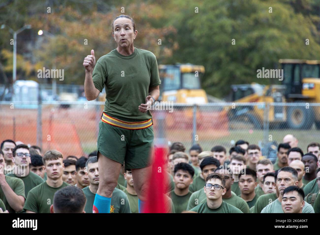 U.S. Marine Corps Col. Ginger E. Beals, the commanding officer of Combat Logistics Regiment (CLR) 2, 2nd Marine Logistics Group, speaks to her Marines after conducting a regimental run on Camp Lejeune, North Carolina, Oct. 28, 2022.  CLR-2 conducted a three-mile formation run with a Halloween theme, allowing Marines to wear socks of their choice, to boost morale and enhance unit cohesion within the regiment. Stock Photo
