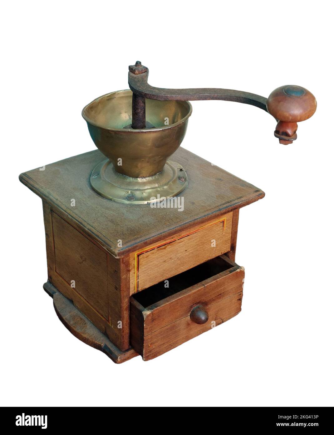 Old wooden manual coffee grinder for grinding coffee beans. Stock Photo