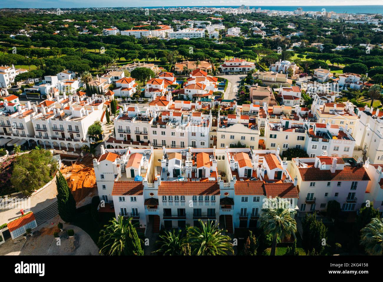 Aerial drone view of Old Village resort, a tranquil setting in The Algarve, surrounded by the Pinhal Golf Course and close to pristine beaches near Stock Photo