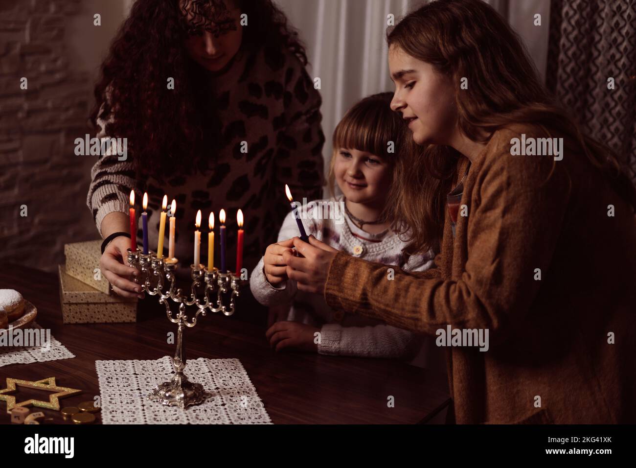 family celebration of the Jewish holiday Hanukkah  at home Stock Photo