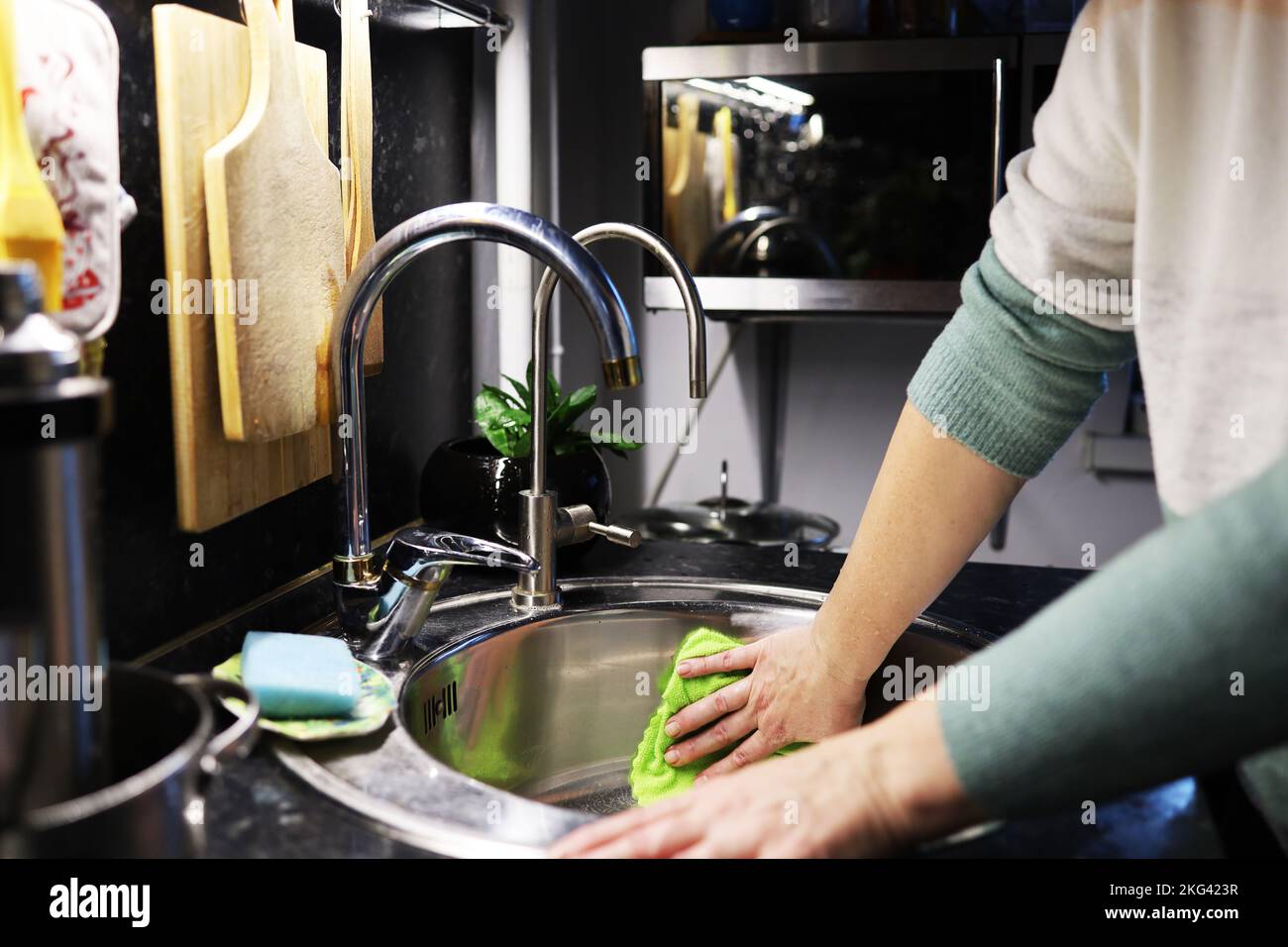 Lady Washing Dishes Images – Browse 3,651 Stock Photos, Vectors, and Video