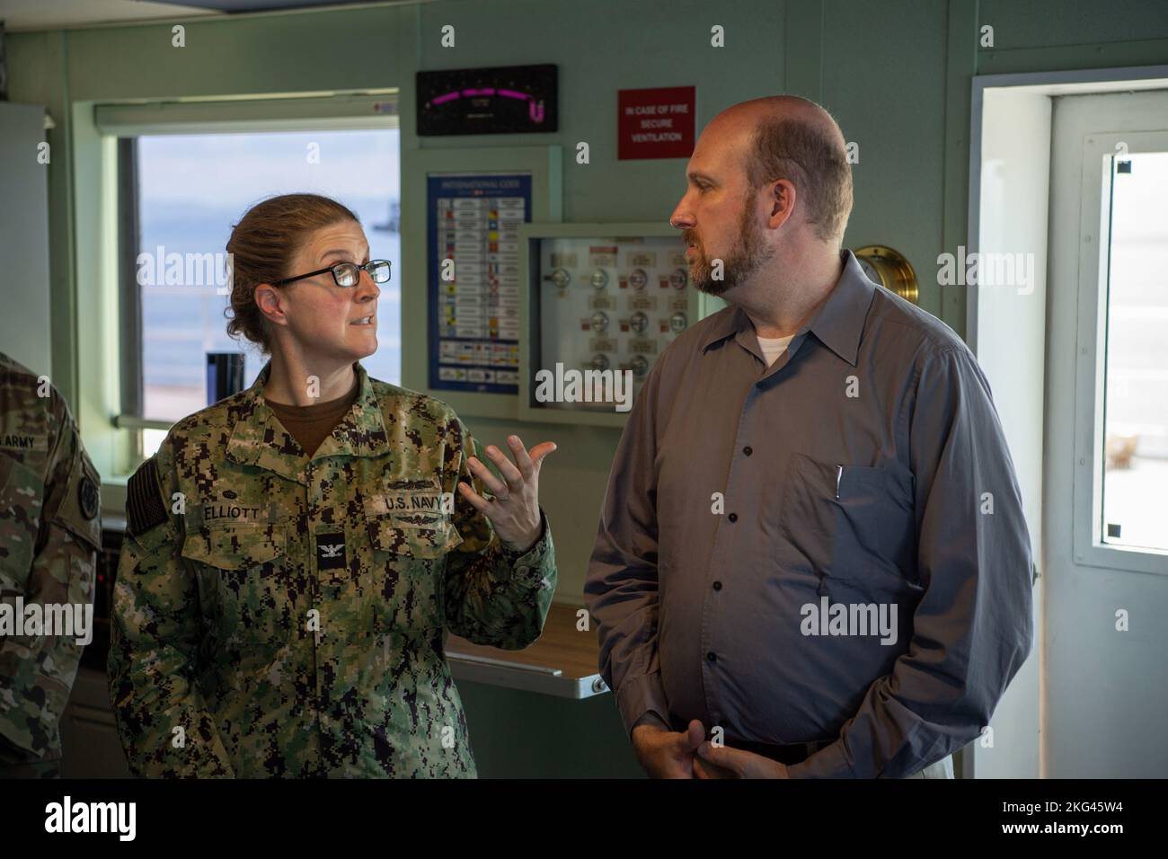 221028-N-TR141-1135 PUERTO BARRIOS, Guatemala (Oct. 28, 2022) Capt. Kathryn S. Elliott, commanding officer of the Medical Treatment Facility aboard the hospital ship USNS Comfort (T-AH 20), speaks with U.S. Ambassador to Guatemala, William Popp, during the ship’s first mission stop for Continuing Promise 2022 (CP22) in Puerto Barrios, Guatemala, Oct. 28, 2022. Comfort is deployed to U.S. 4th Fleet in support of CP22, a humanitarian assistance and goodwill mission conducting direct medical care, expeditionary veterinary care, and subject matter expert exchanges with five partner nations in the Stock Photo