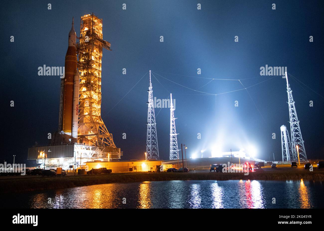 Artemis I Rollout. NASA’s Space Launch System (SLS) rocket with the Orion spacecraft aboard is seen atop the mobile launcher as Crawler Transporter-2 (CT-2) begins to climb the ramp at Launch Pad 39B, Friday, Nov. 4, 2022, at NASA’s Kennedy Space Center in Florida. NASA’s Artemis I mission is the first integrated test of the agency’s deep space exploration systems: the Orion spacecraft, SLS rocket, and supporting ground systems. Launch of the uncrewed flight test is targeted for Nov. 14 at 12:07 a.m. EST. Stock Photo