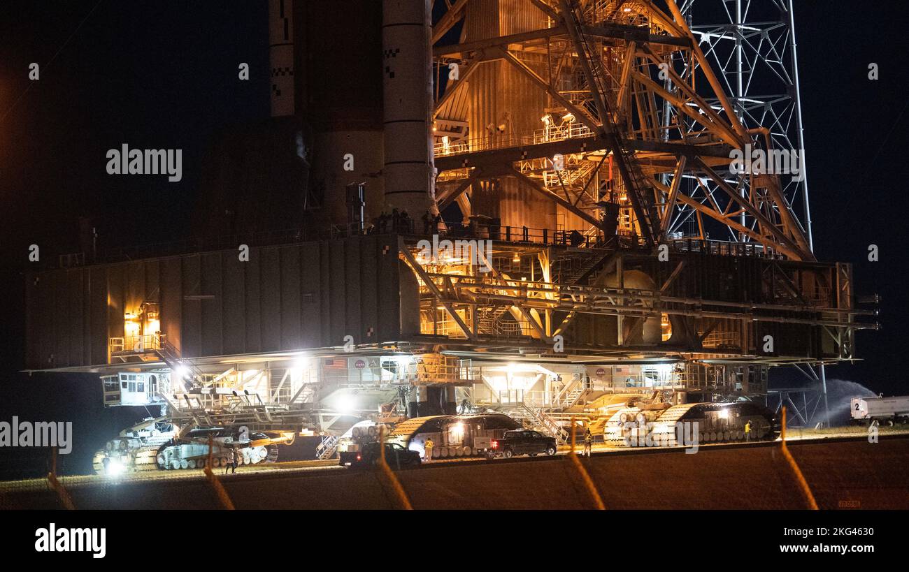 Artemis I Rollout. NASA’s Space Launch System (SLS) rocket with the Orion spacecraft aboard is seen atop the mobile launcher as Crawler Transporter-2 (CT-2) begins to climb the ramp at Launch Pad 39B, Friday, Nov. 4, 2022, at NASA’s Kennedy Space Center in Florida. NASA’s Artemis I mission is the first integrated test of the agency’s deep space exploration systems: the Orion spacecraft, SLS rocket, and supporting ground systems. Launch of the uncrewed flight test is targeted for Nov. 14 at 12:07 a.m. EST. Stock Photo