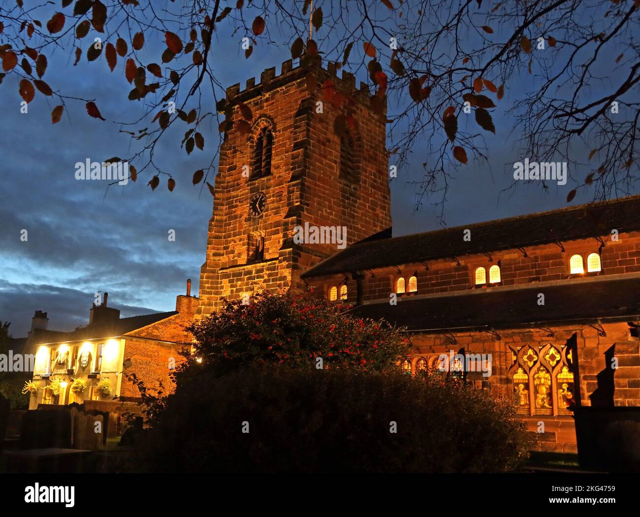 Centre of village, St Wilfrids Church Lane, Grappenhall, Warrington, Cheshire, England, UK, WA4 2SJ , at dusk, Grade I listed Stock Photo