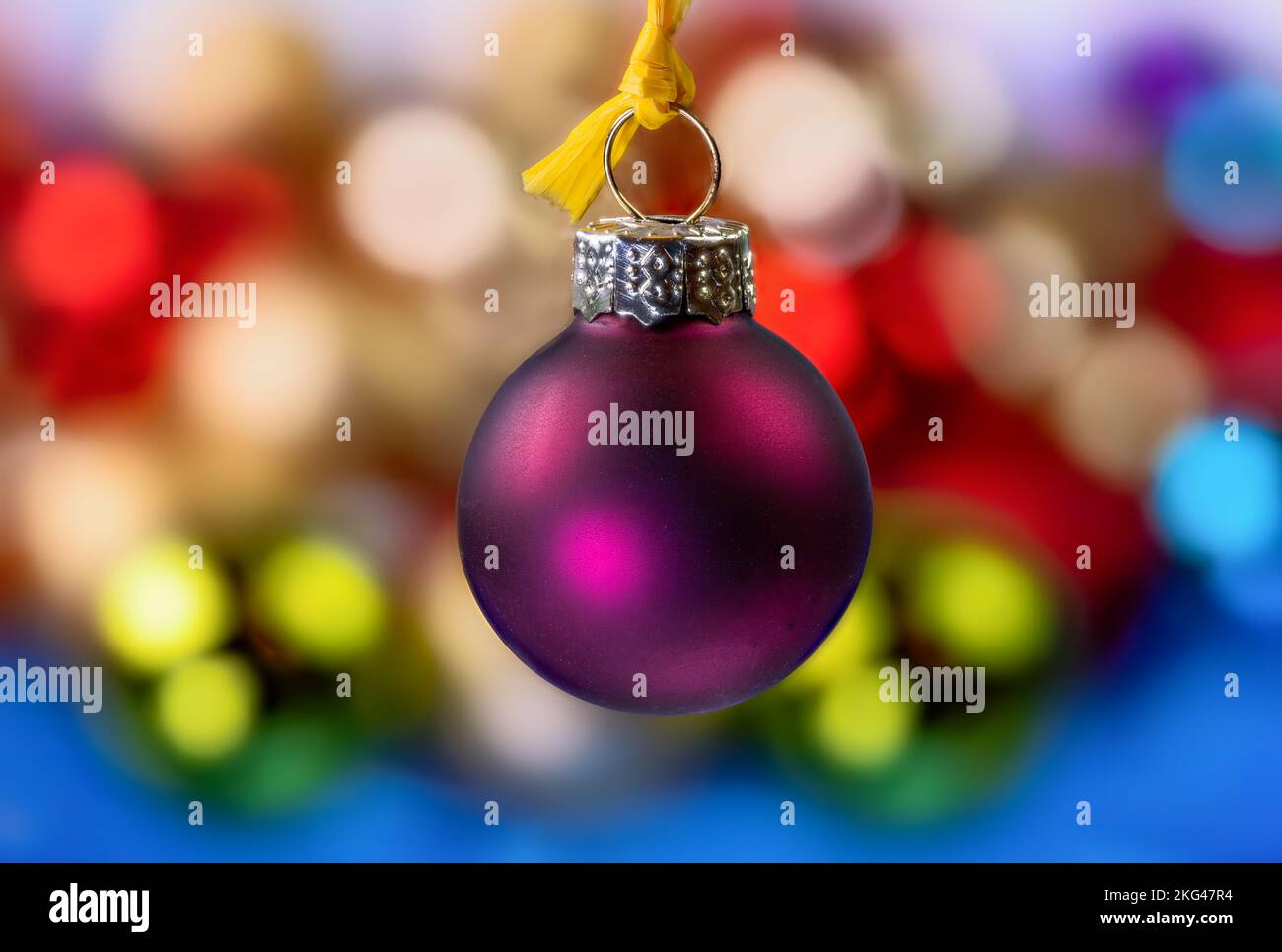Closeup of an hanging purple christmas ornament Stock Photo