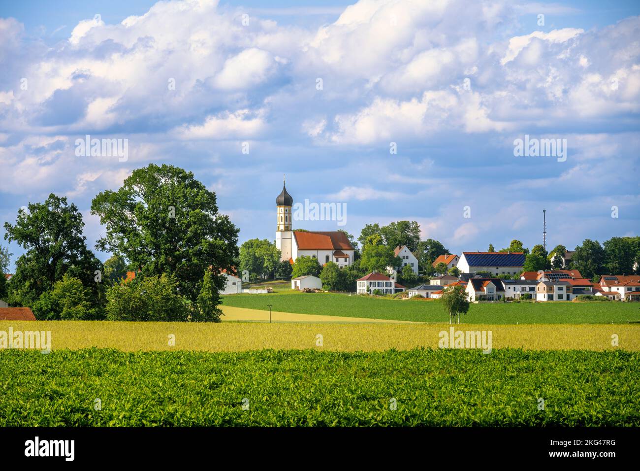 Landscape with a an idyllic village called Berg im Gau in Bavaria Stock