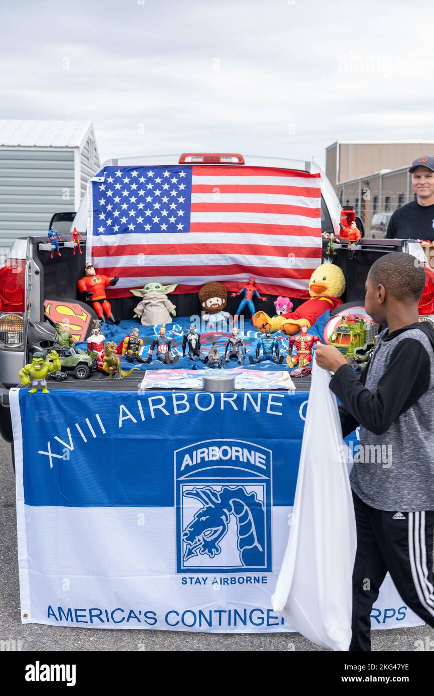 Soldiers and their families dress in costumes and trick or treat during