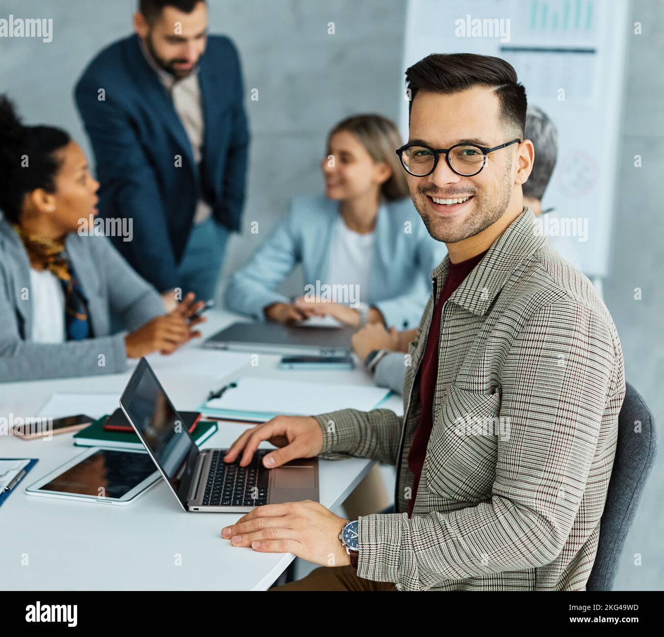 young business people meeting office teamwork group whiteboard presentation seminar man businesswoman startup creative training portrait Stock Photo