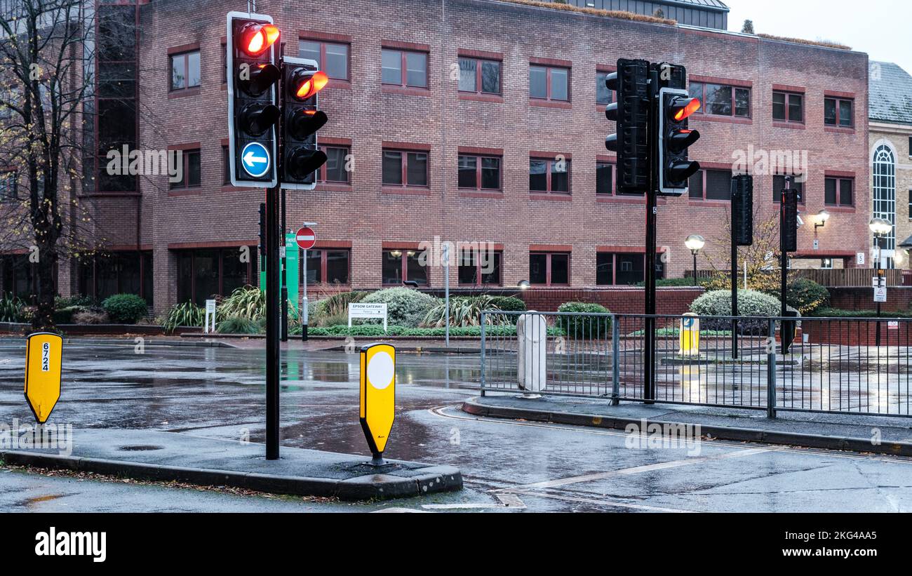 Epsom, Surrey, London UK, November 20 2022, Red Traffic Lights At A Major Wet Road Junction With No People Stock Photo