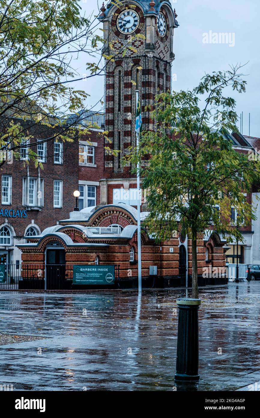 Epsom, Surrey, London UK, November 20 2022, Historic Old Epsom Clock Tower On A Wet Morning And Empty High Street With No People Stock Photo